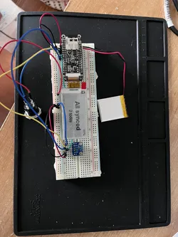 An electronics breadboard with several small components wired for a development project