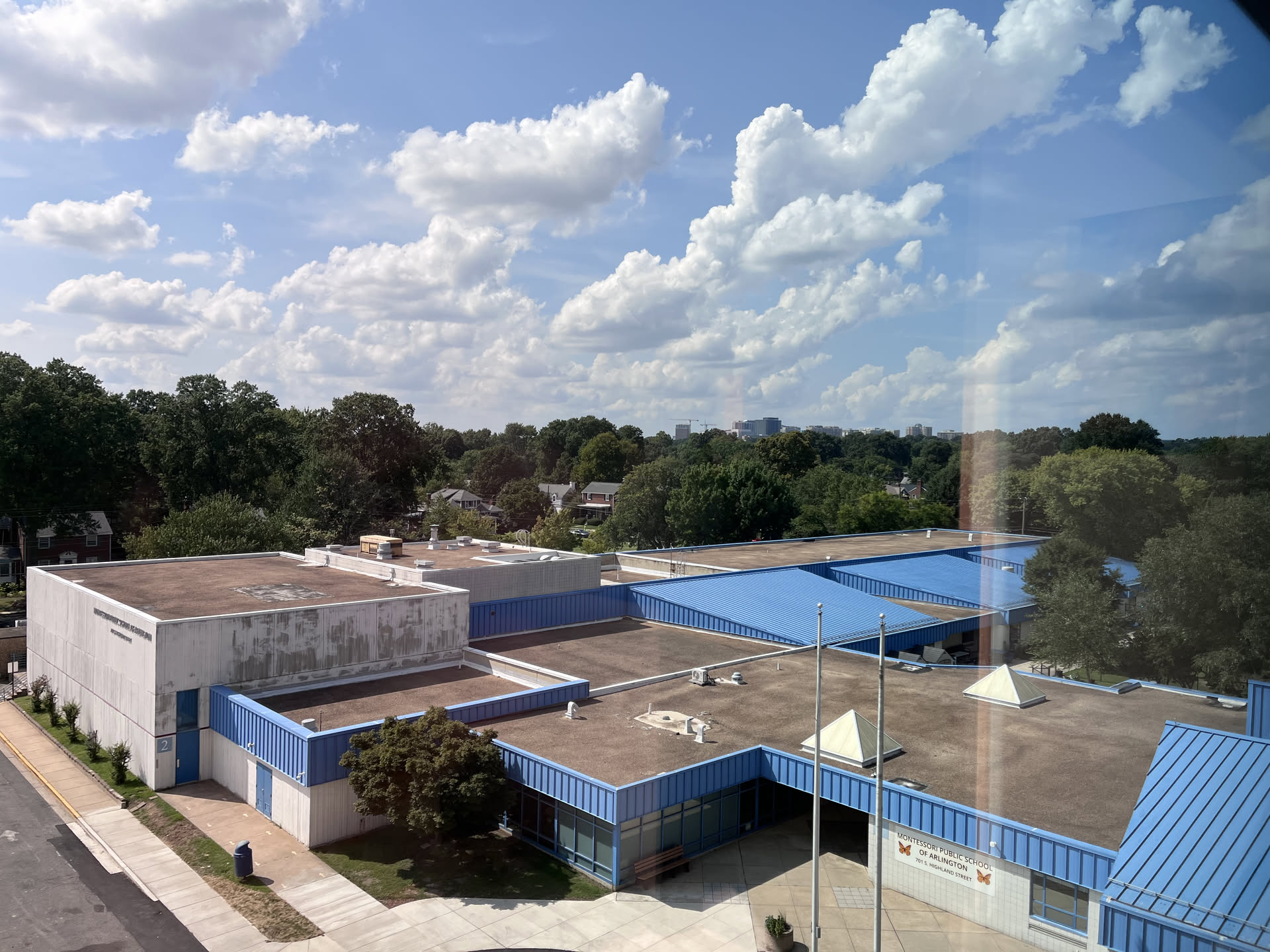 View from my classroom window. Most of the view is taken up by the roof of the neighboring elementary school.